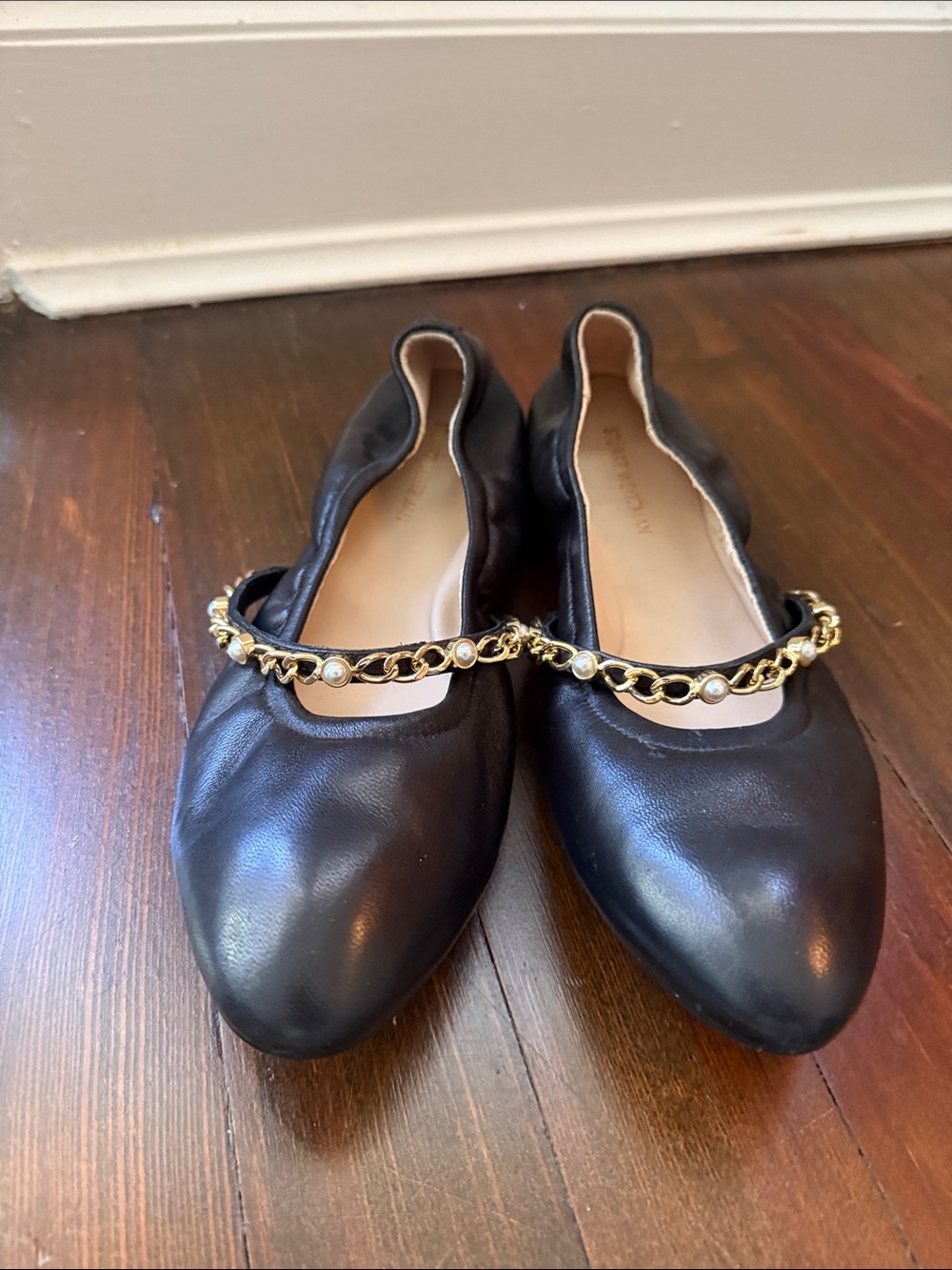 NWOTStuart Weitzman Black Leather Ballet Flats with Gold Chain Detail - Women 8B